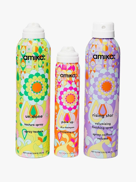 Amika Big Mood Volumizing Styling Set in branded components on a light gray background